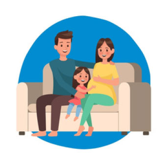 A cartoon representation of a family sitting on a sofa, comprising of a man, a pregnant woman and a small child.